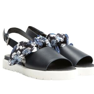 Mother of Pearl Ordell Bow Sandal, $330.